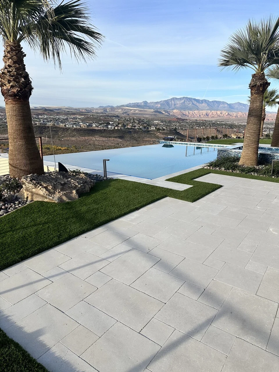Poolside outdoor living area overlooking the Utah landscape