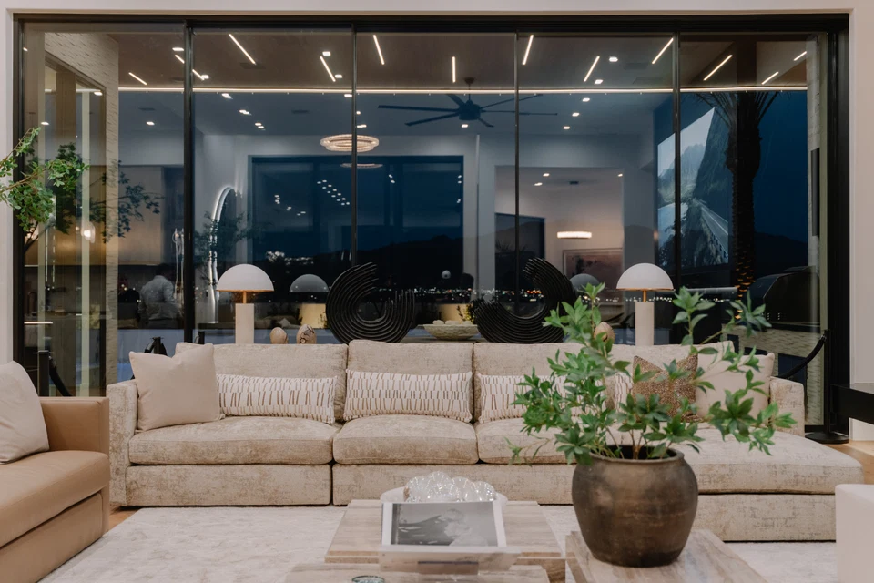 Bright living space with considered architectural lighting