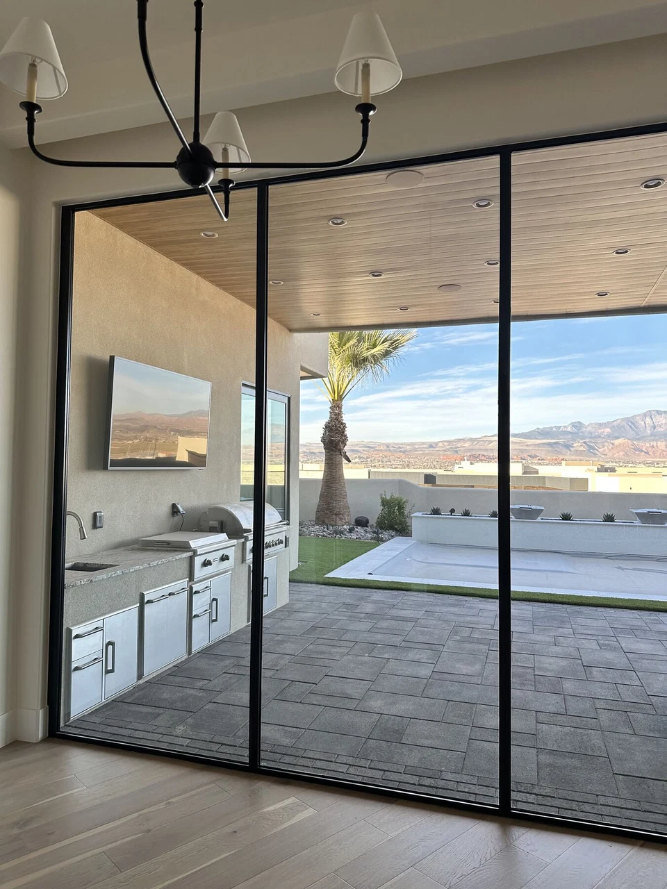 Sliding glass doors from the dining area to a covered patio