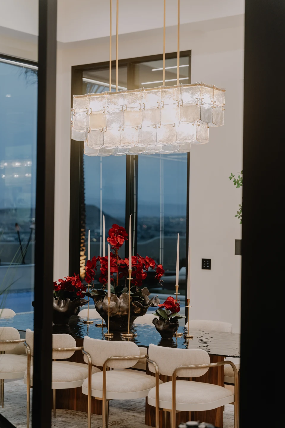 Dining and living space with layered light